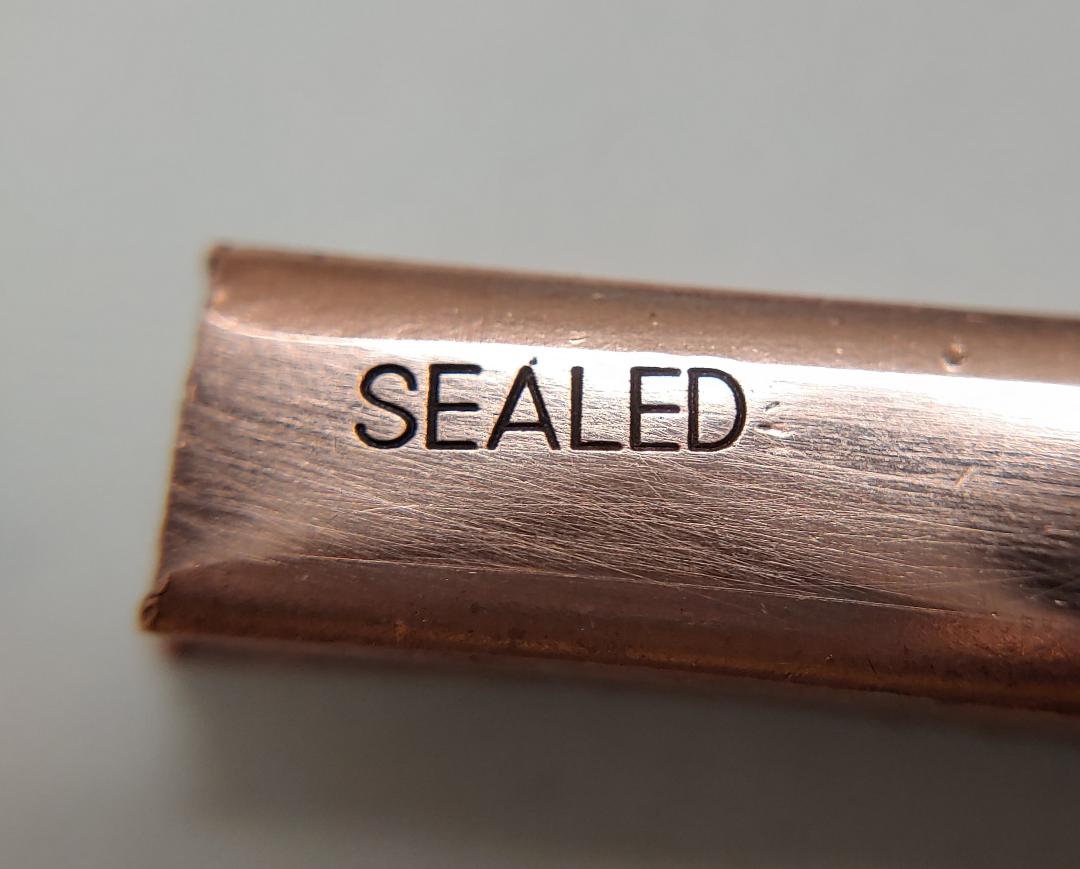 jewelry stamp sealed